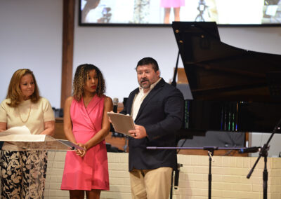 BARC's Jarrad Mears w/ BARC Foundation Leslie Devillier and Kara Willis.